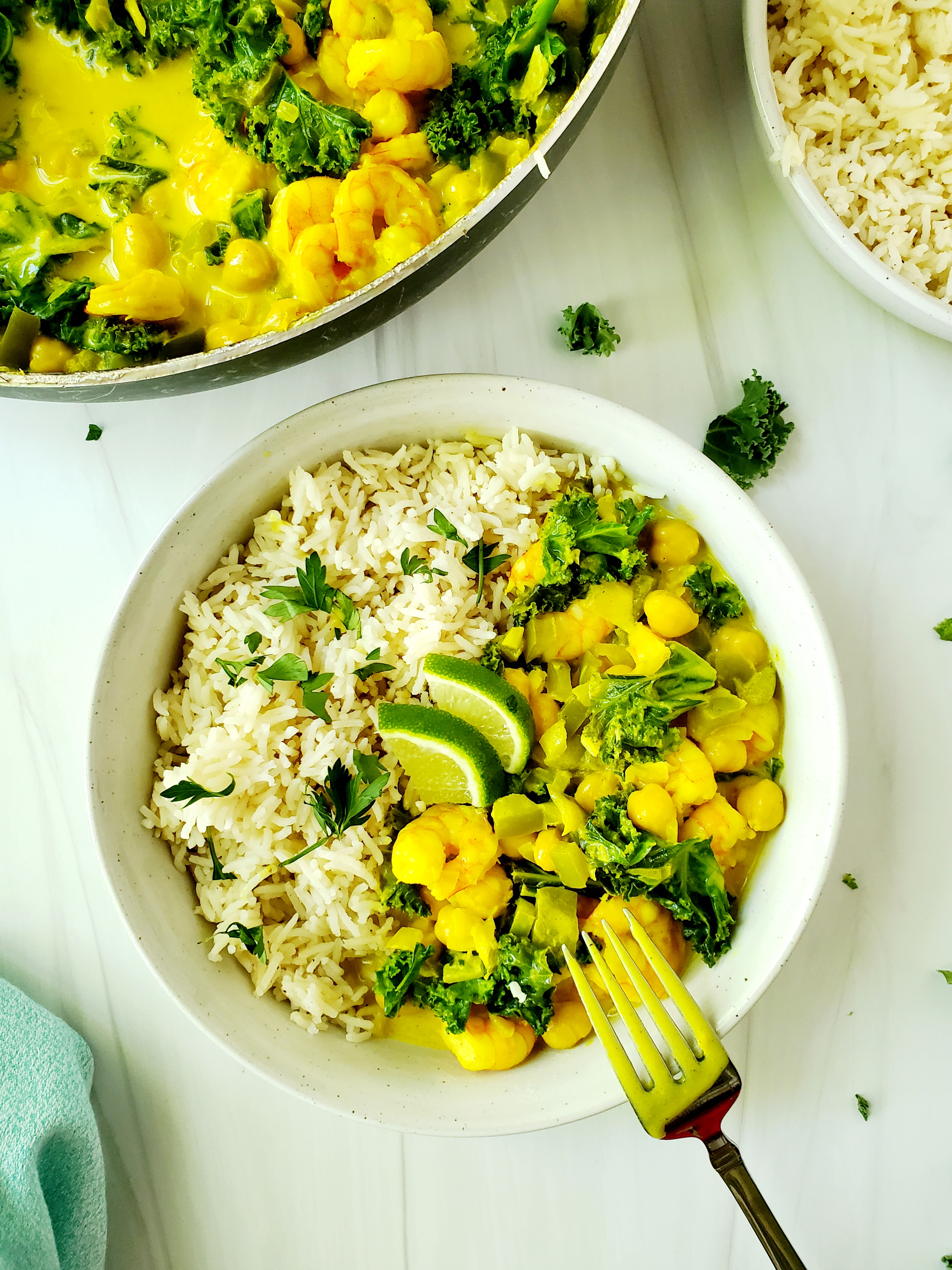 bowl of jasmine rice with shrimp, kale, and turmeric curry