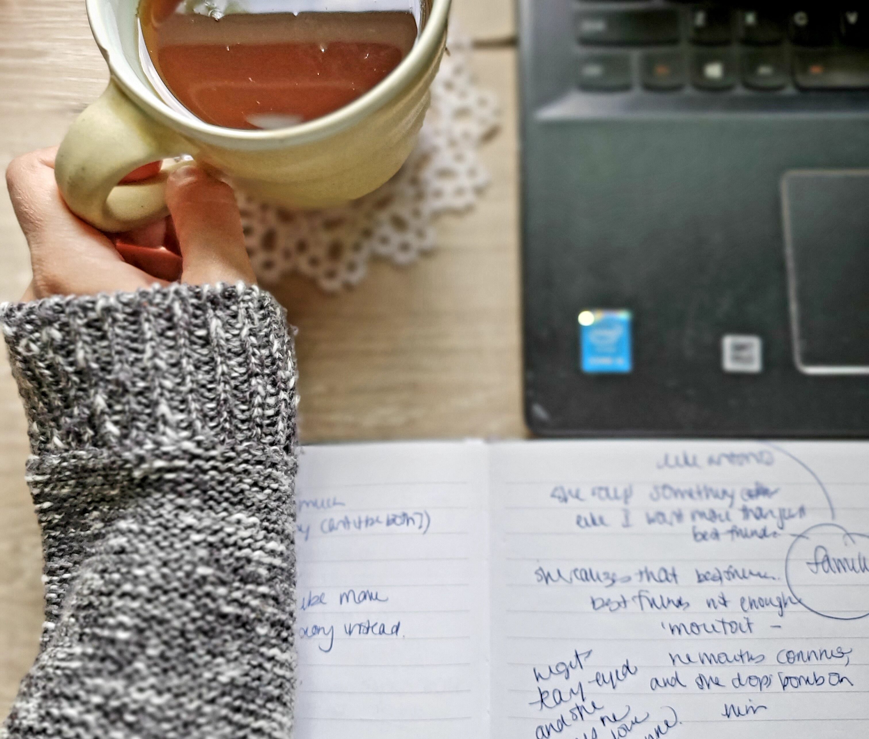 sweater, mug, laptop, notebook