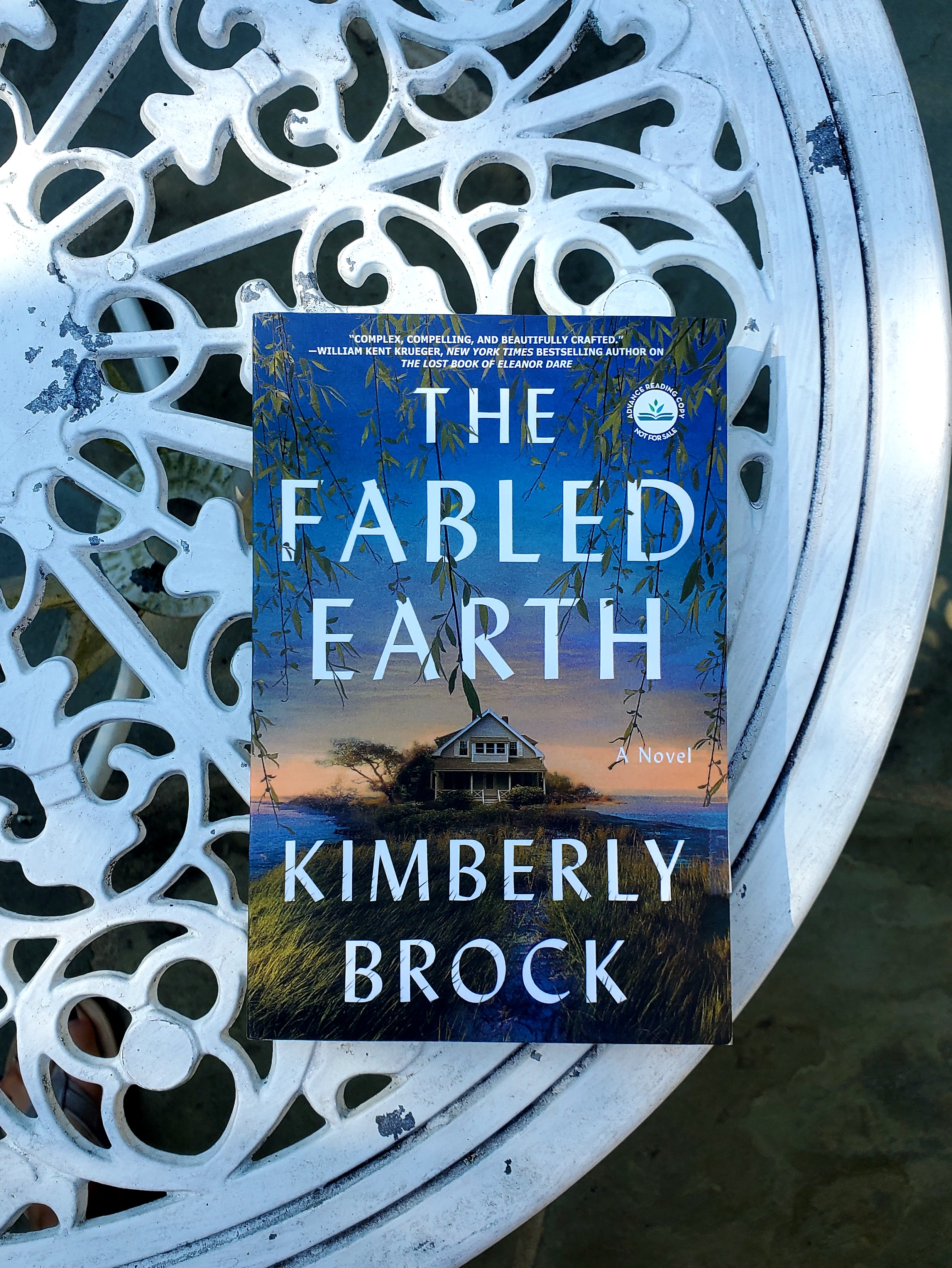 book cover of the fabled earth by kimberly brock