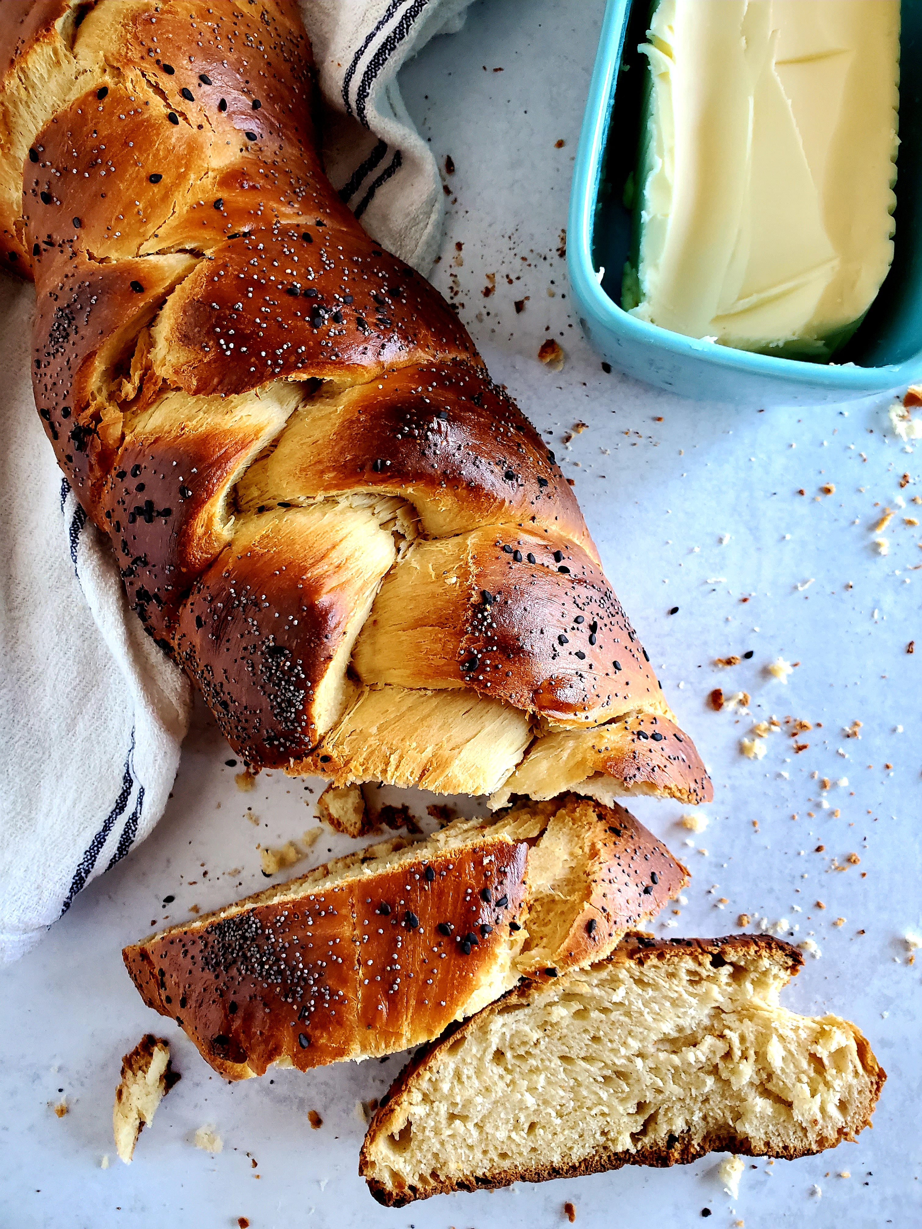 braided challah bread and butter